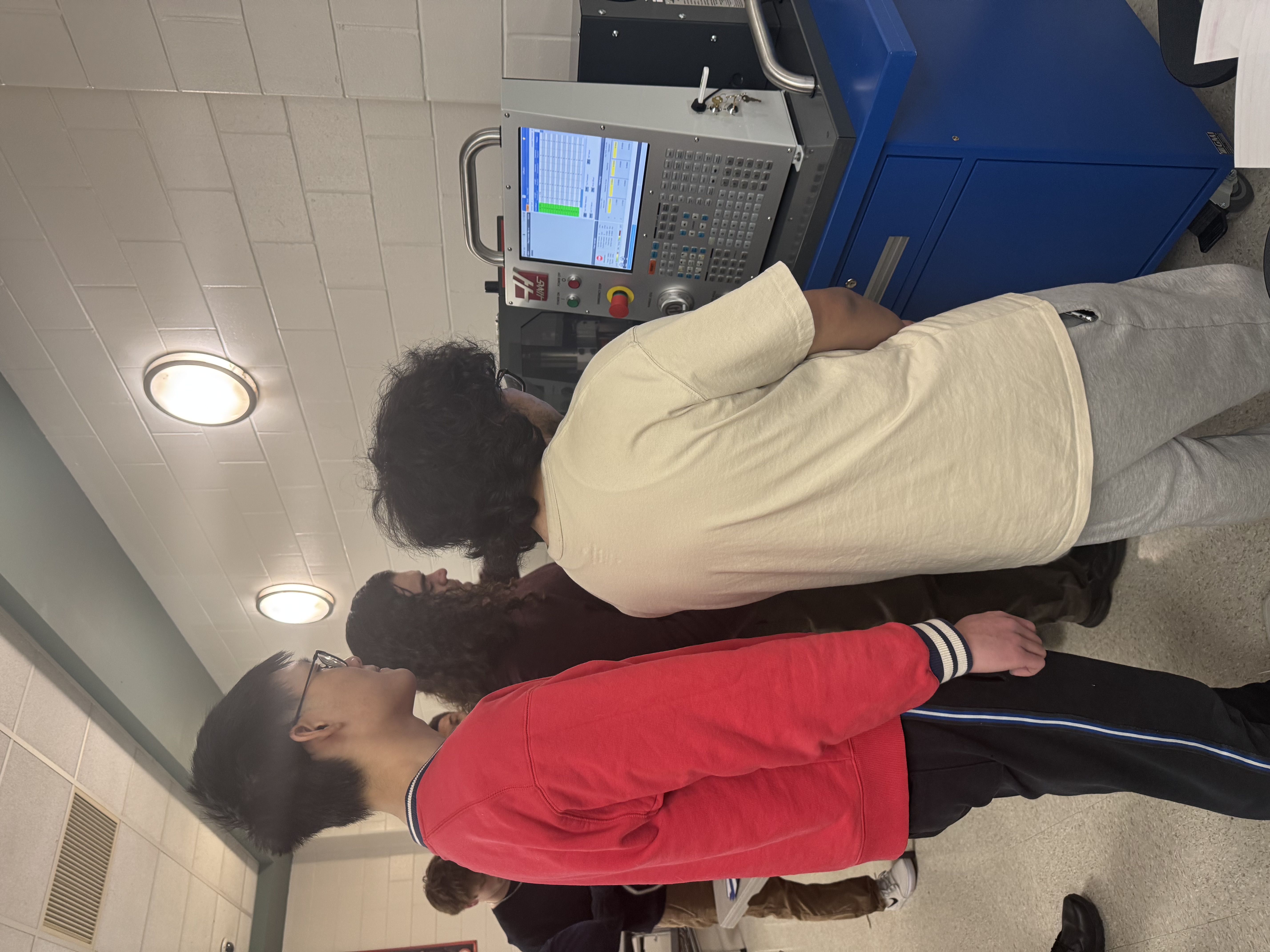 students with CNC machine